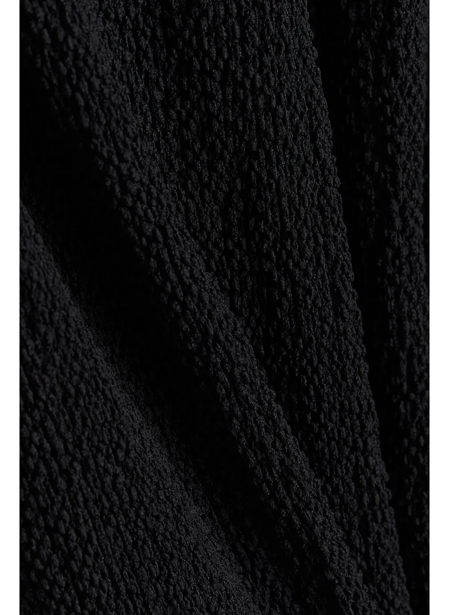 H&M Flared Textured Trousers