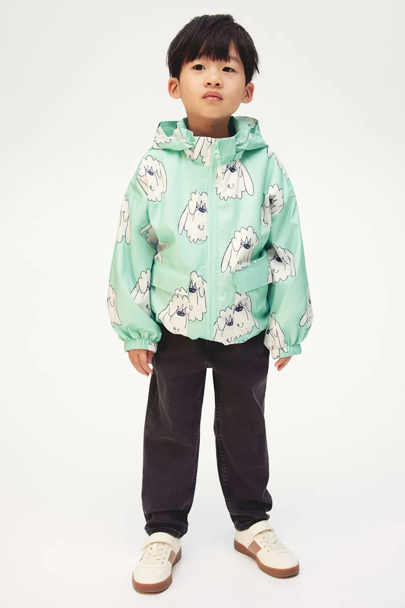 اتش اند ام جاكيت للحماية من الرياح مزين بطبعة