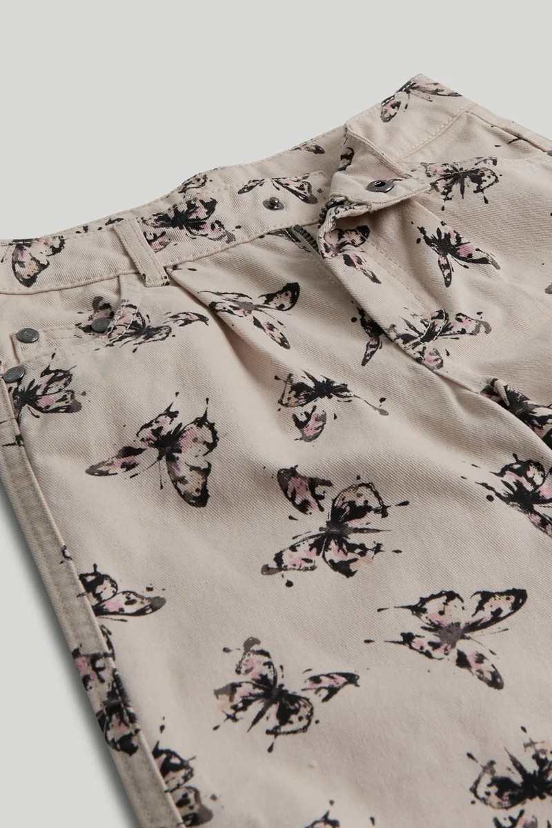 مذركير جينز واسع الساق بفراشة