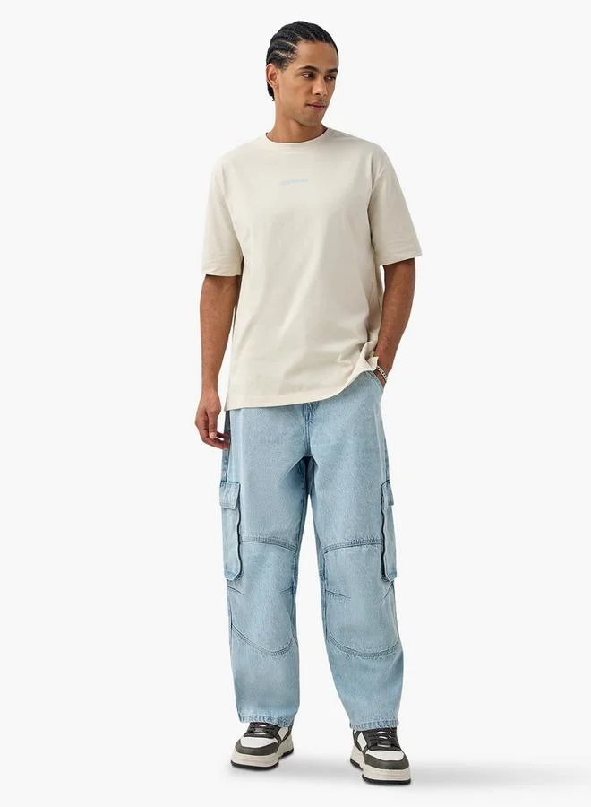 ستارتر تيشيرت ستارتير بطبعة شعار وأكمام قصيرة