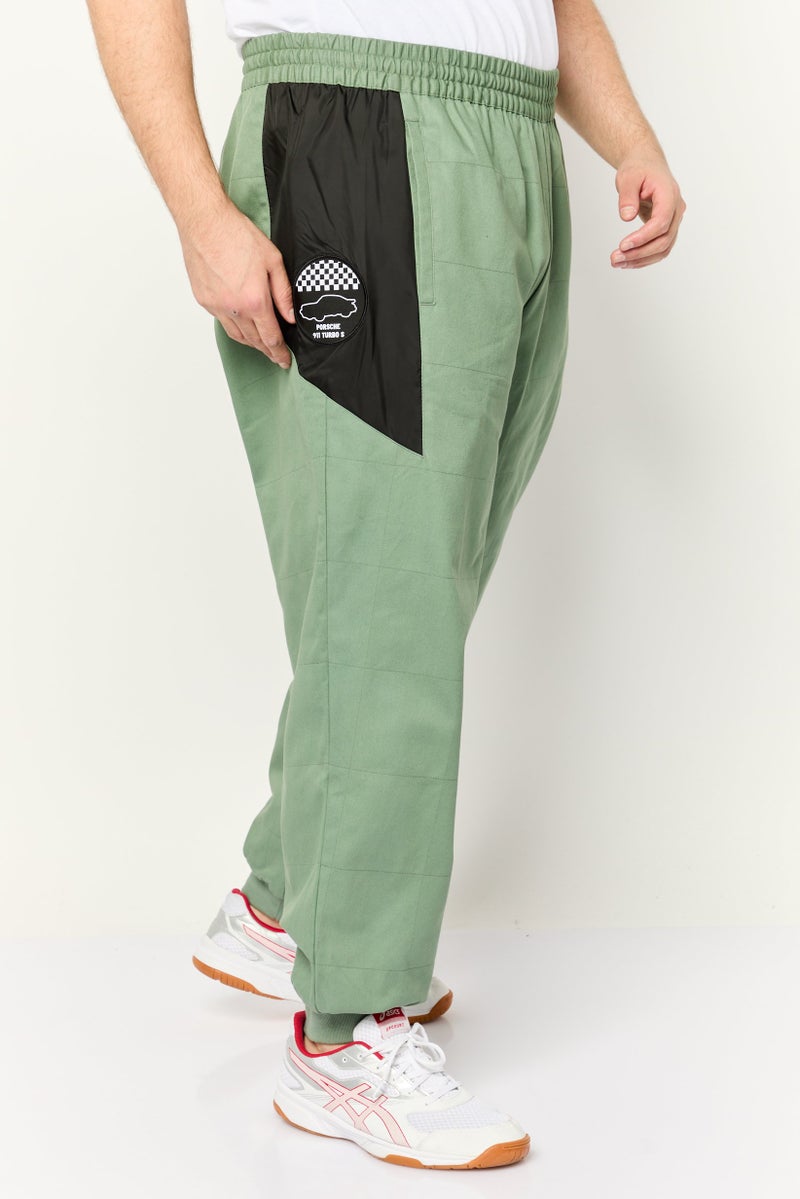 PUMA Men Sportswear Fit Porsche Outdoor Track Pants, Olive/Black - Image 2
