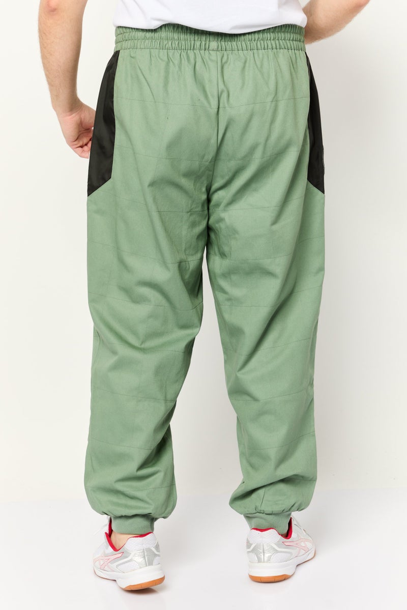 PUMA Men Sportswear Fit Porsche Outdoor Track Pants, Olive/Black - Image 4