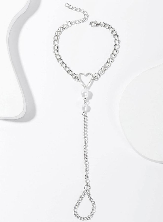 Silver bracelet with distinctive link chain decorated with pearls with heart-shaped ring design - Image 2