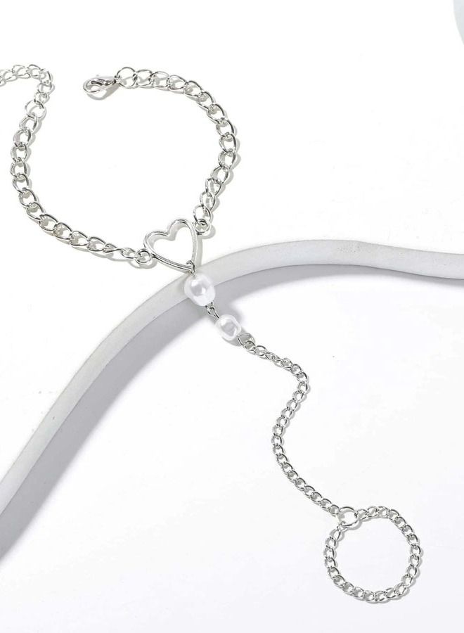 Silver bracelet with distinctive link chain decorated with pearls with heart-shaped ring design - Image 4