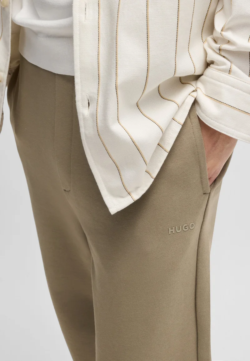 HUGO Cotton-terry tracksuit bottoms with logo print