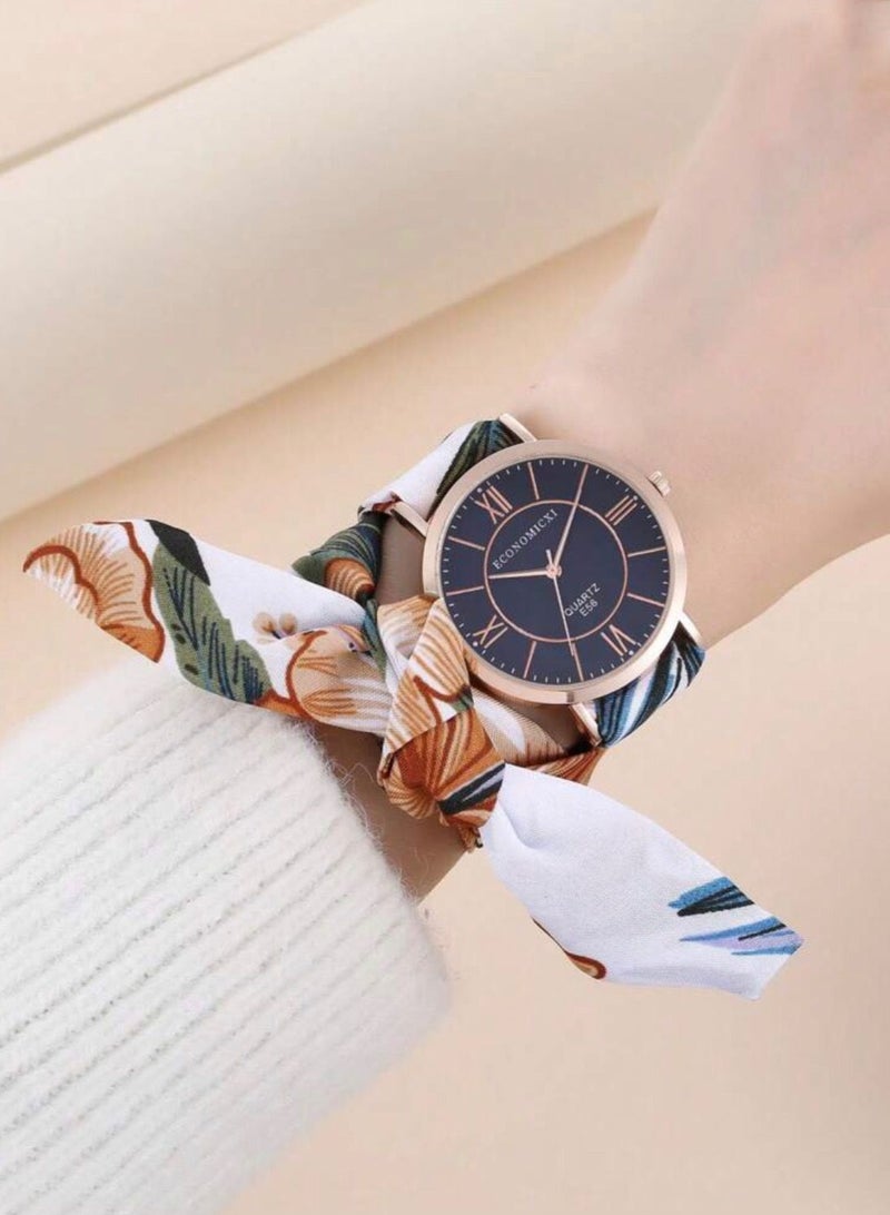 ECONOMICXI Casual Watch For Women With Colored Fabric Strap - Image 1