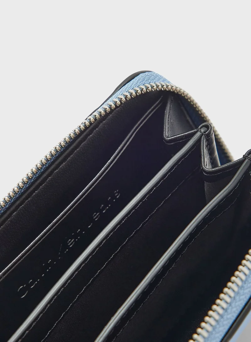 Calvin Klein Jeans Quilted Medium Zip Around Purse