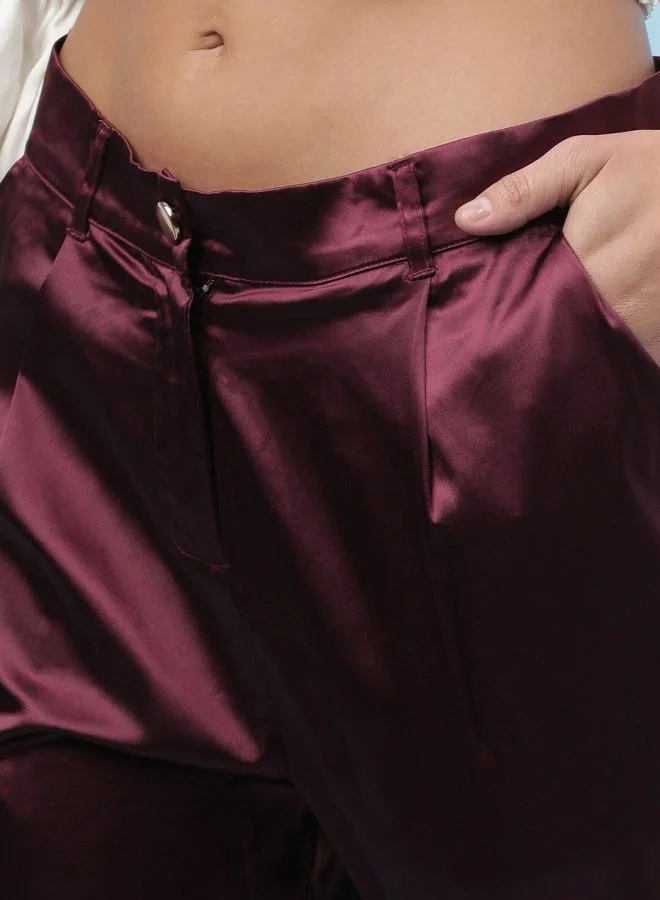 مرفوعة Women Tapered Solid Mid-Rise Pants