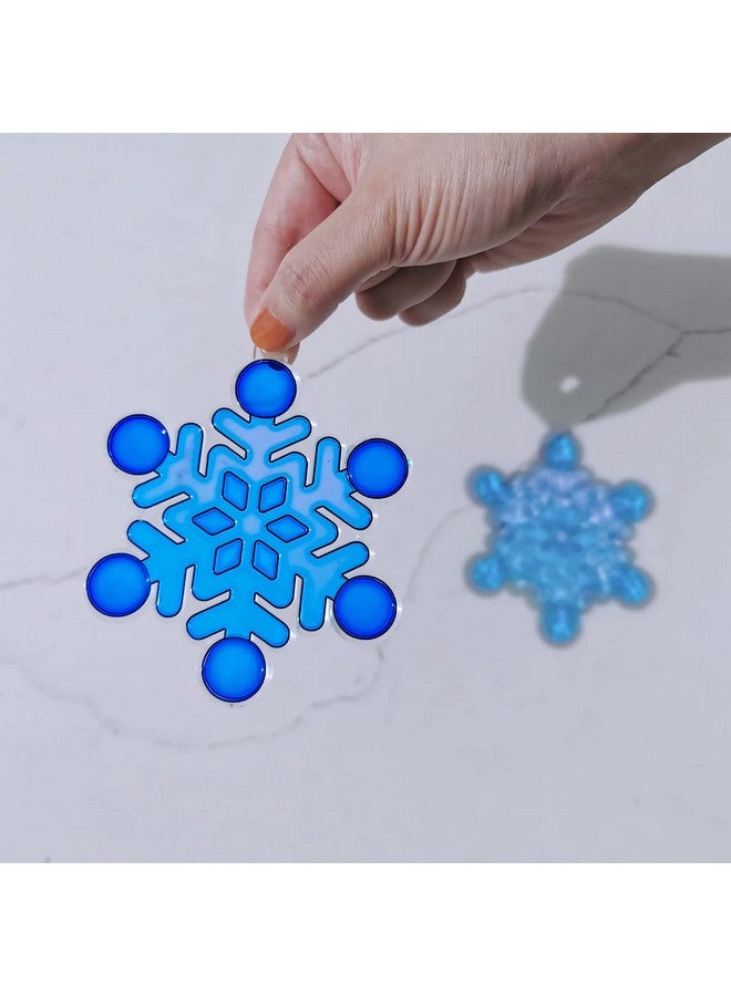 وينلين 24 مجموعة من زينة مصائد الشمس على شكل رقاقات الثلج لتزيين النوافذ بنفسك، أدوات حرفية لتزيين الكريسماس، مصائد الشمس المعلقة على شكل رقاقات الثلج للأطفال، أنشطة حفلات الكريسماس والشتاء في المنزل - Image 5