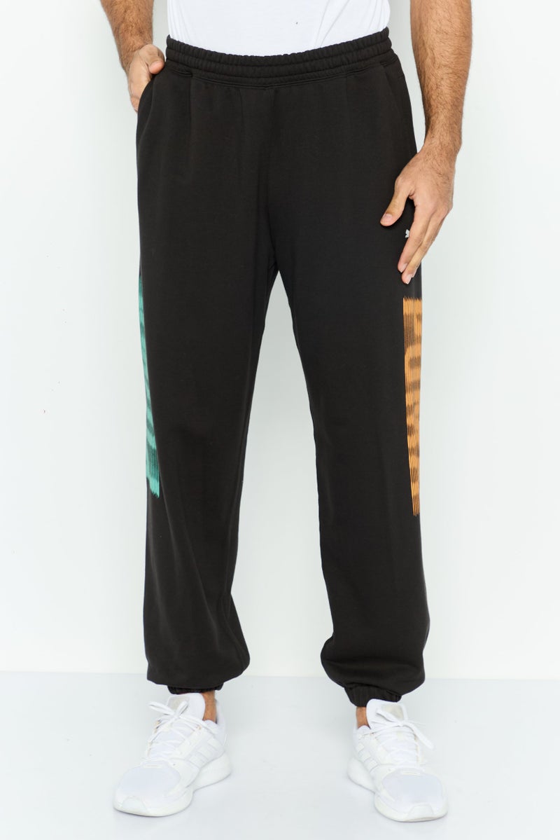 PUMA Men Relaxed Fit Training Sweatpants, Black Combo  - Image 1