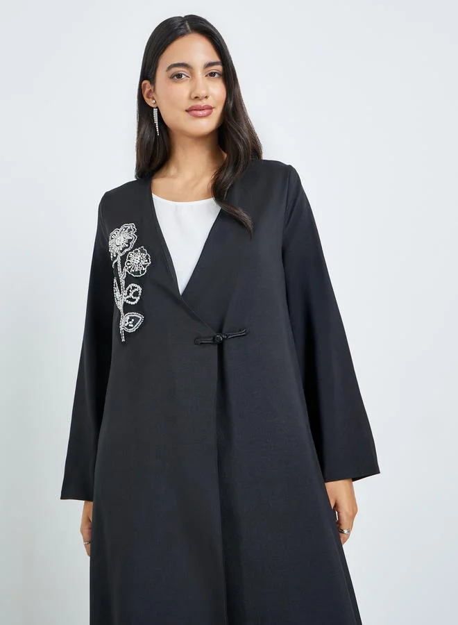 أميرة عباية برقعة خرز وأزرار عروة