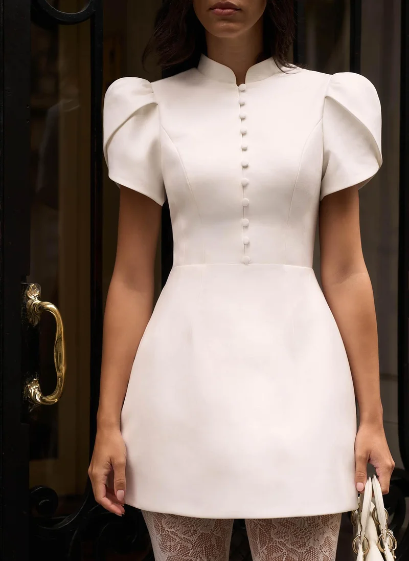 Lichi Mini dress with high collar and button fastening