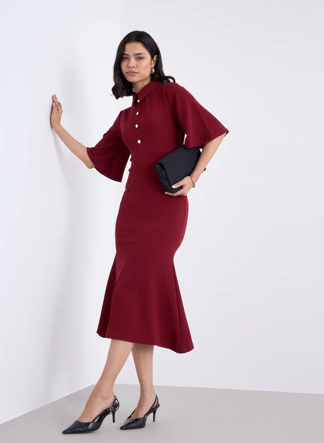 ستايلي فستان ميدي ميرميد سادة بأزرار أمامية