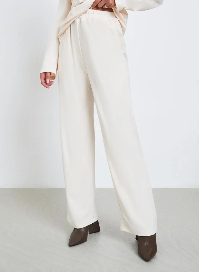 Styli  Solid Belted Top and Wide Leg Trousers Co-ords for Women | Best Price UAE
