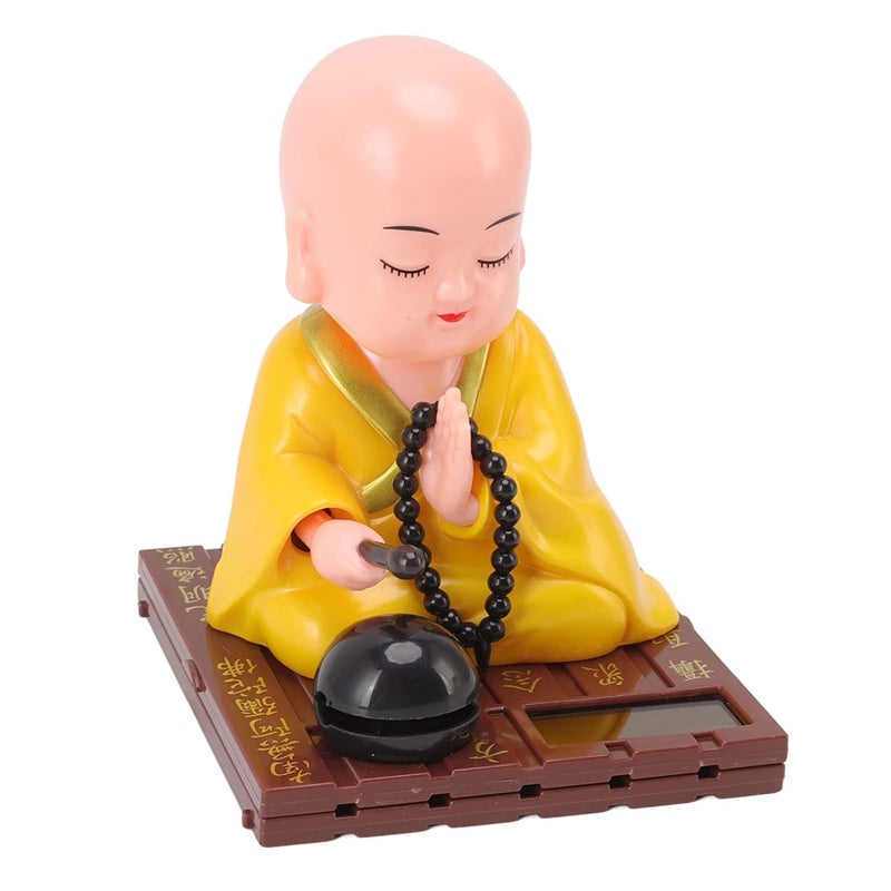AUGEN Small Buddhist Monk Solar Ornaments, Automatic Nodding Lucky Meaning Light Energy Sensing Eco Friendly Solar Buddhist Monk Statue Decoration for Home Car Dashboard (Pack of 1)(D, Yellow) - Image 1