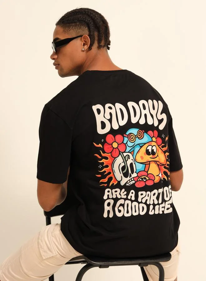 بوشيرت تيشيرت واسع بطبعة كتابة