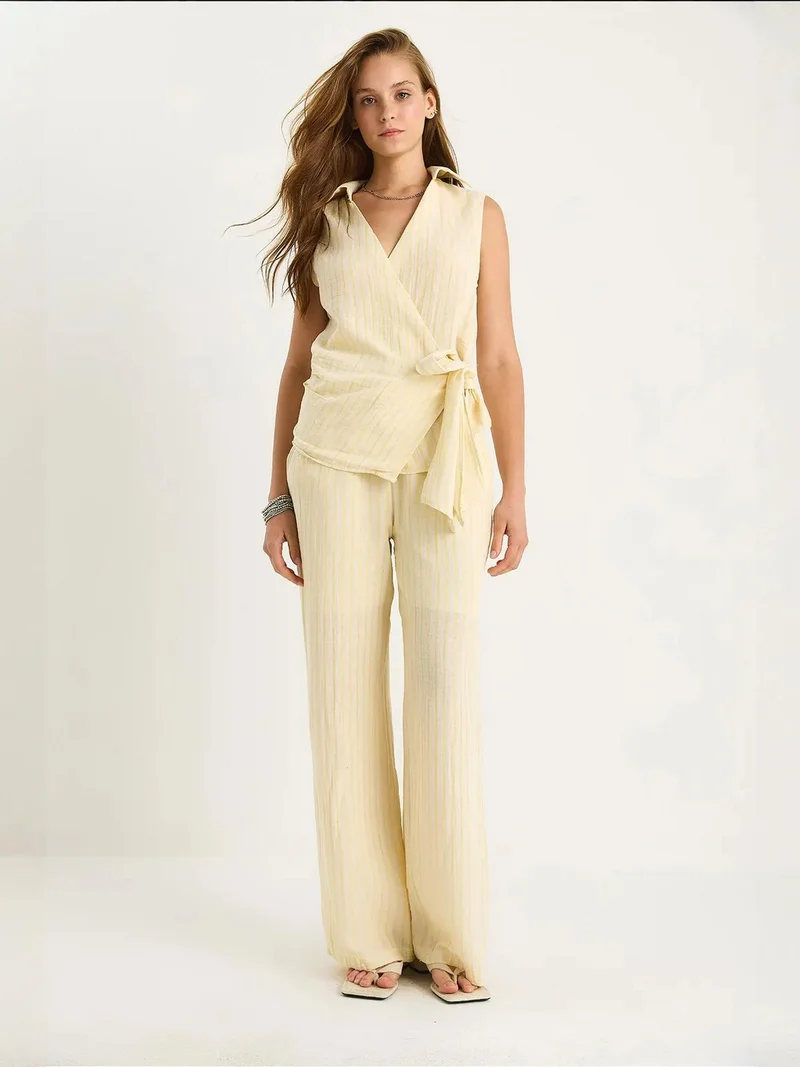 Bianco Lucci LUCCI Striped V-Neck Buttoned High Waist Wide Leg Two-Piece Set