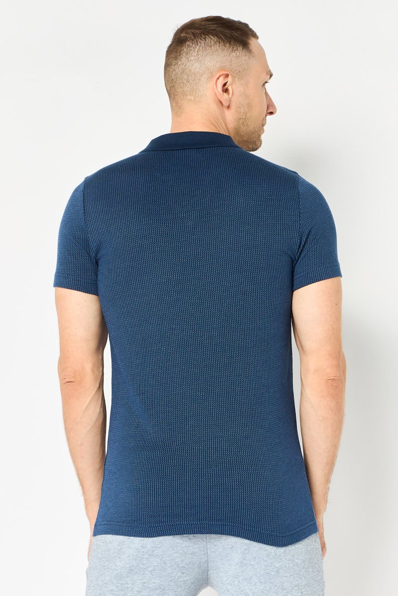 PUMA Men Slim Fit Short Sleeve Embroidered Logo Outdoor Polo Shirt, Navy - Image 4