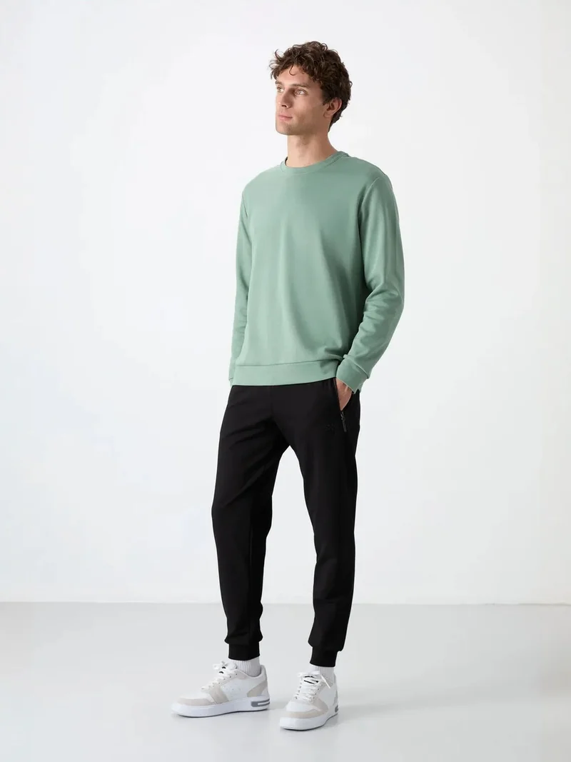 تومي لايف TOMMY Men's Solid Pull-on Sweatpants With Zip Pocket