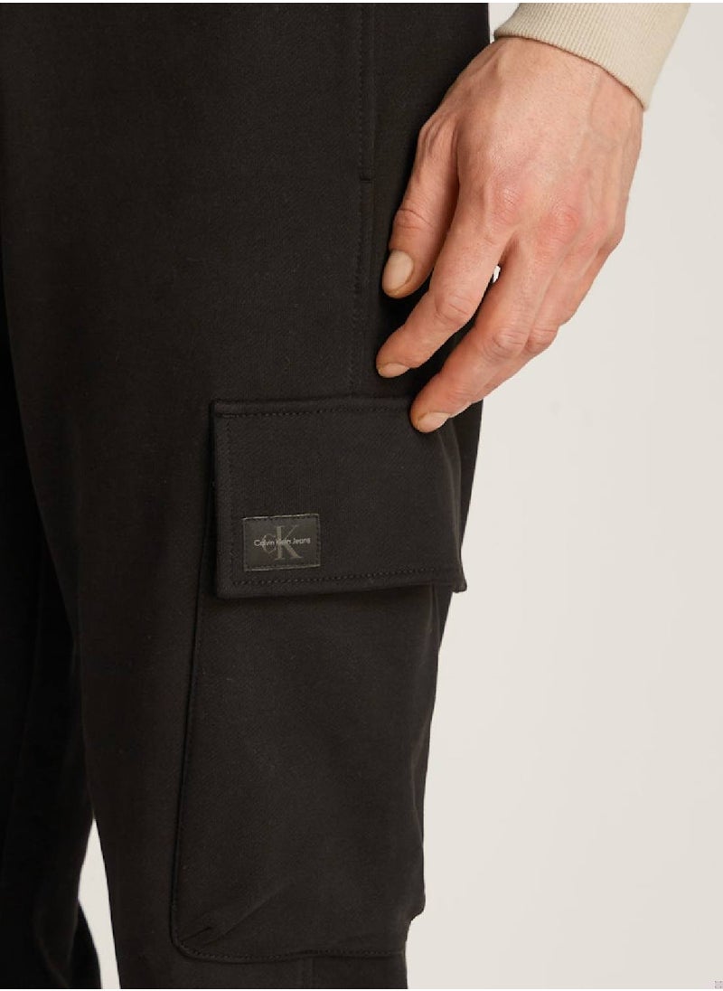 Calvin Klein Jeans Men's Woven Label Sweatpants - Cotton, Black  - Image 4