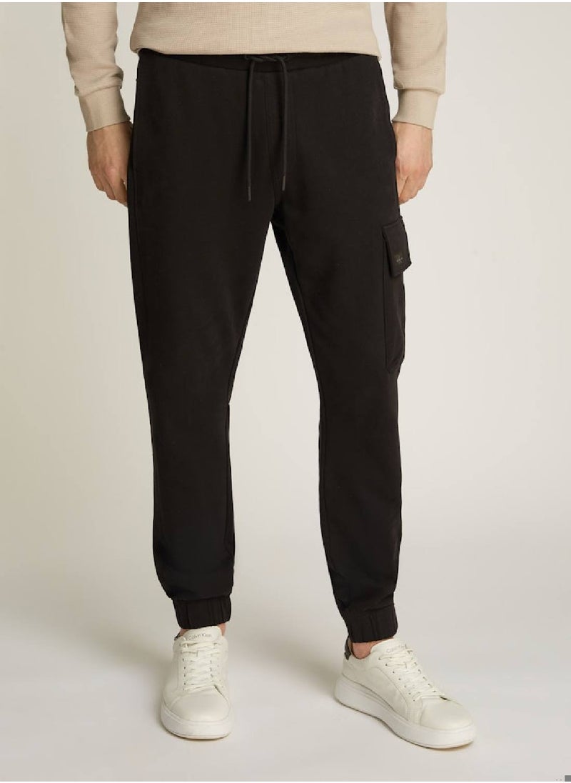Calvin Klein Jeans Men's Woven Label Sweatpants - Cotton, Black  - Image 1