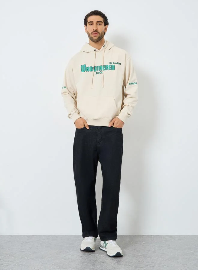 Styli Men Cream Graphic Print Relaxed Fit Hoodie