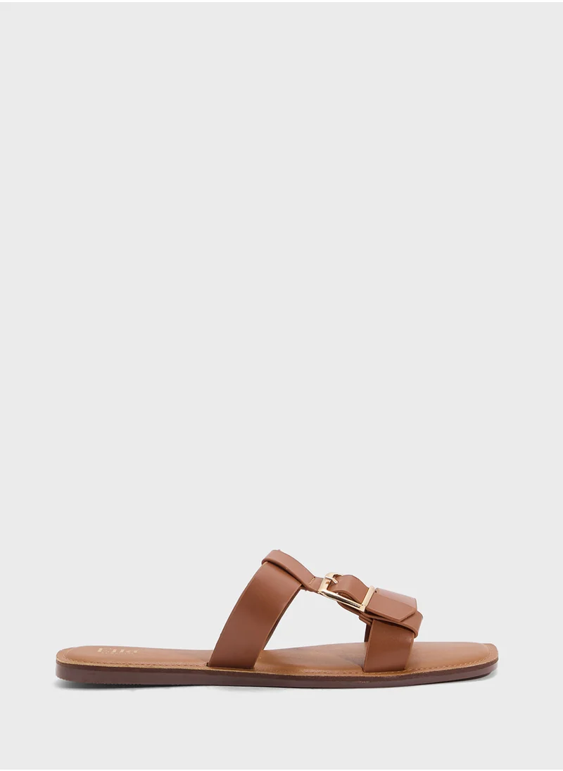 ايلا Flat Sandal With Buckle