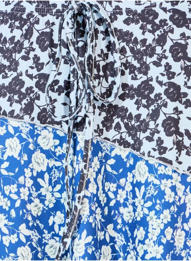 Styli Floral Asymmetric Hem Midi Skirt with Overlock Seam