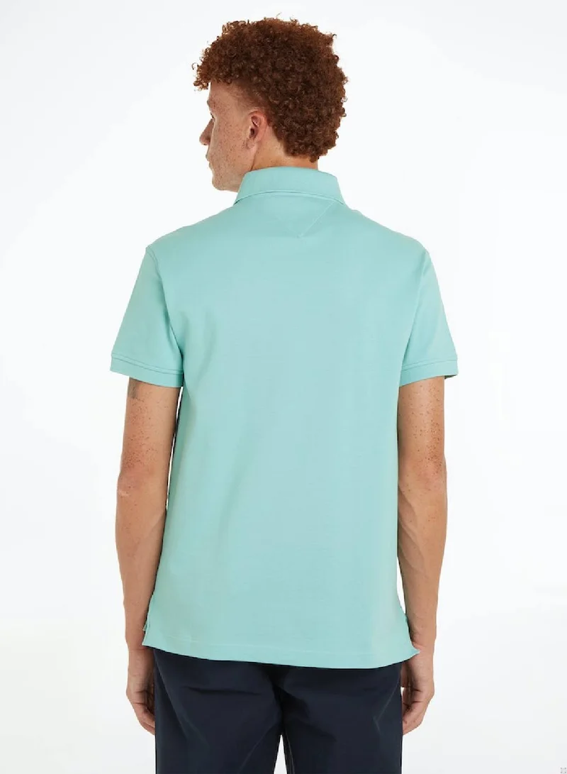 TOMMY HILFIGER Men's 1985 Collection Flag Embroidery Slim Polo -  Stretch organic cotton, Blue