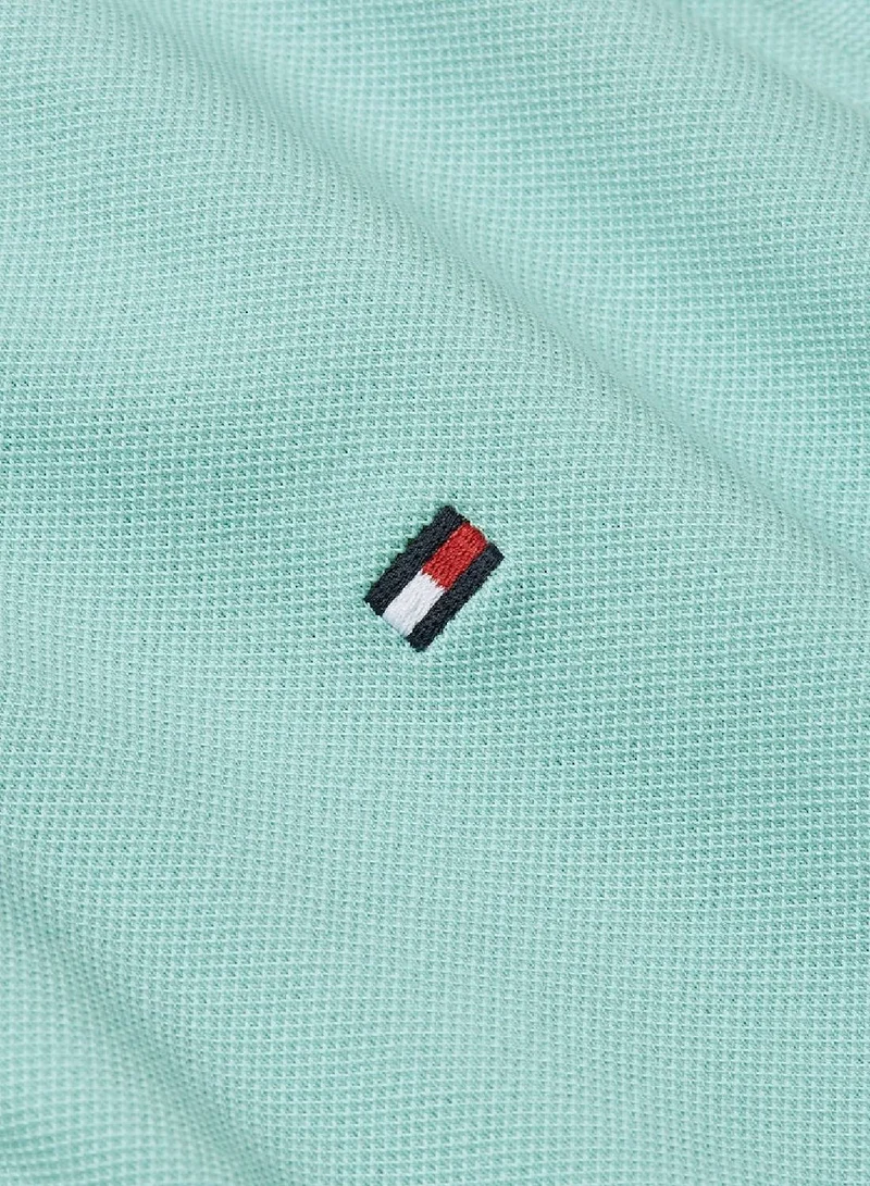 TOMMY HILFIGER Men's 1985 Collection Flag Embroidery Slim Polo -  Stretch organic cotton, Blue