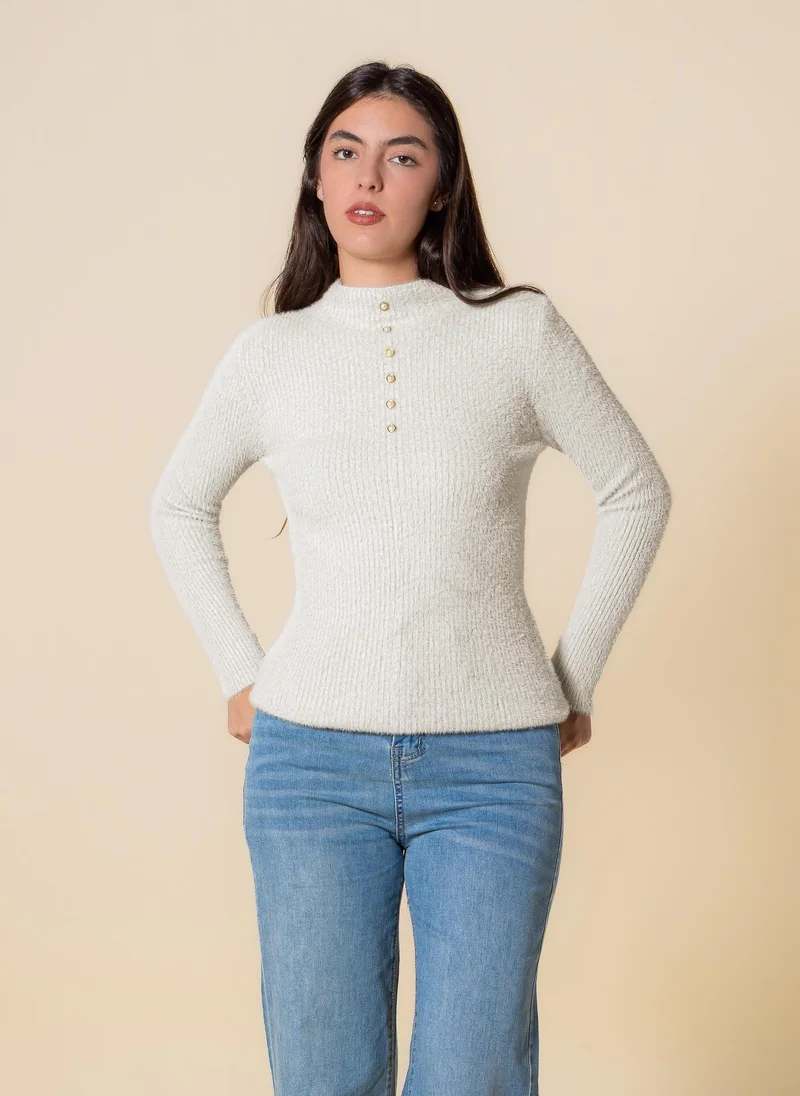 SHAPES DETAILED KNIT HIGH NECK TOP