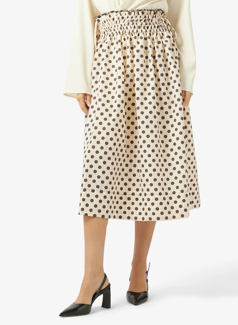 ايلا تنورة منقطة