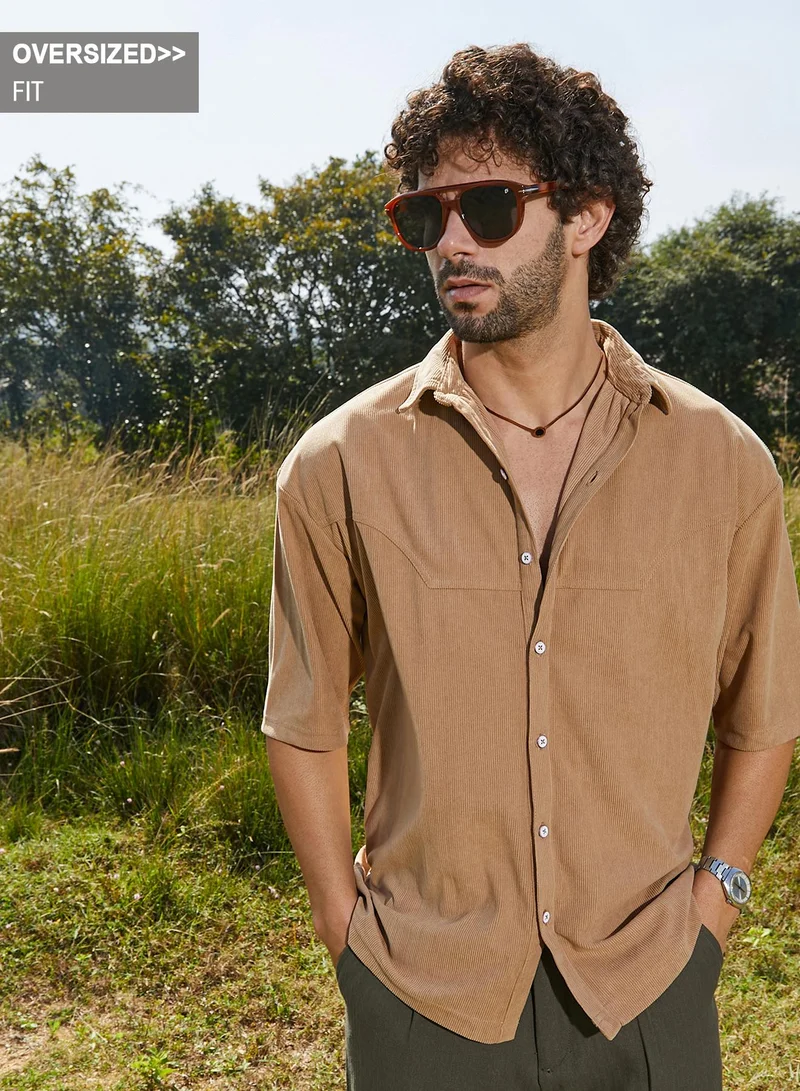 Campus Sutra Campus Sutra Men's Khaki Beige Corduroy Oversized Shirt For Casual Wear | Spread Collar | Short Regular Sleeves | Button Closure | Oversized Shirt Crafted With Comfort Fit For Everyday Wear