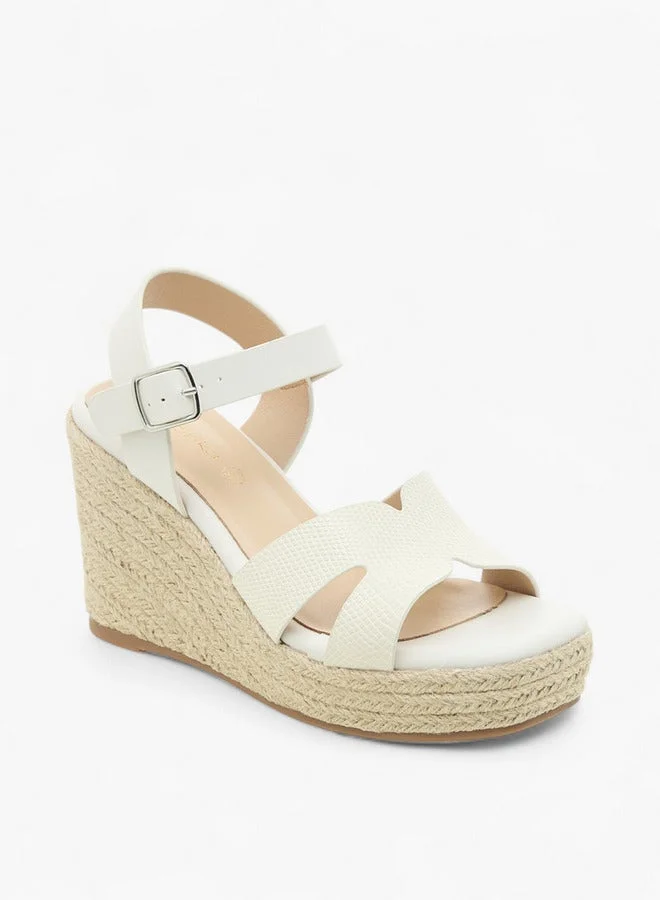 بابريكا صنادل نسائية بكعب إسفين بنقوش وإبزيم