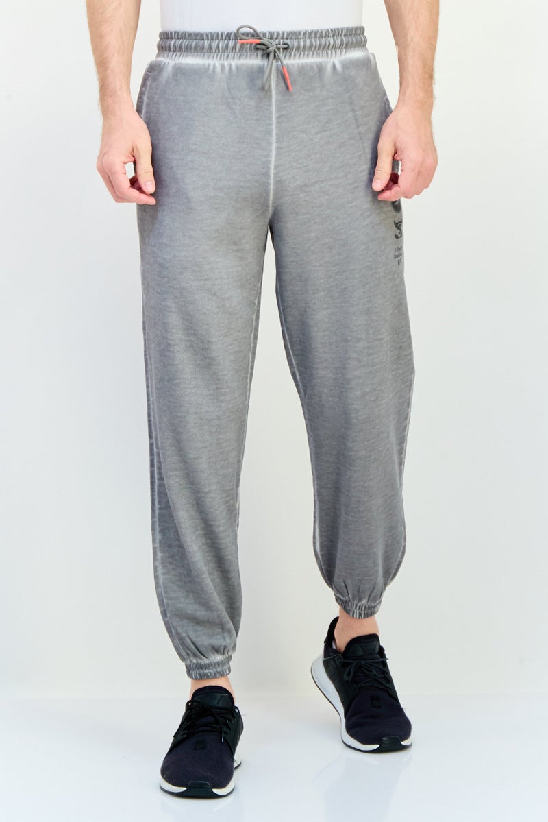 Puma x Staple Men Sportswear Fit Outdoor Sweatpants, Grey - Image 1