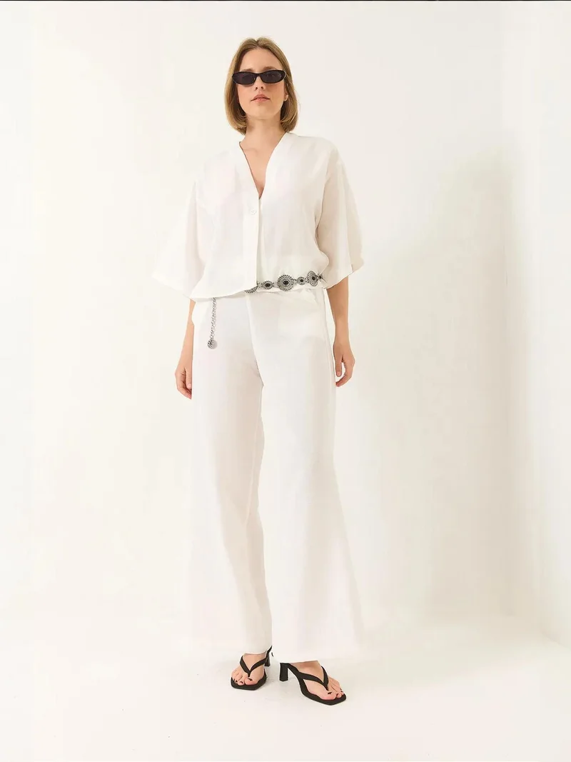 بيانكو لوتشي طقم تونيك بياقة على شكل حرف  وبنطلون واسع الساق من لوتشي