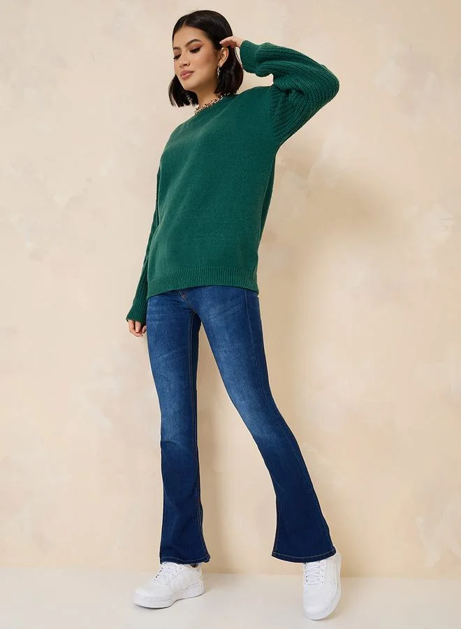 ستايلي Oversized Sweater With Cable Knit Sleeves