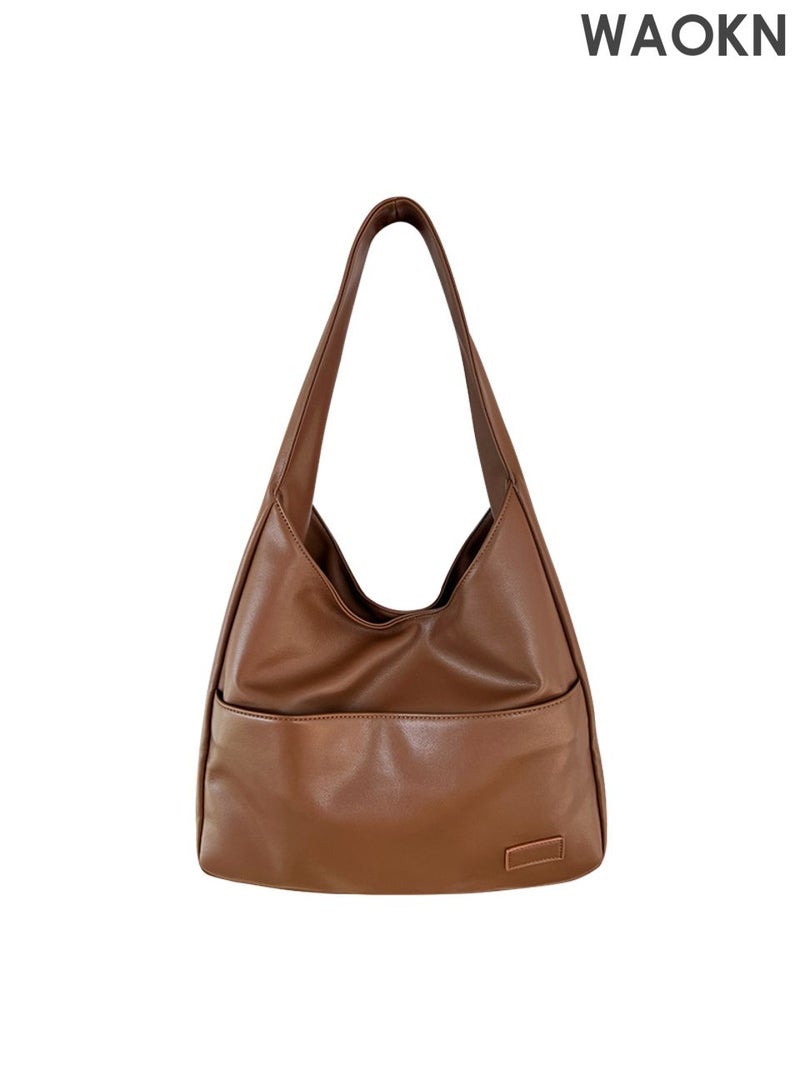 دبليو أيه أو كي أن حقيبة كتف نسائية ورجالية، حقيبة عملية كبيرة السعة، حقيبة يد بتصميم بسيط ولون سادة من مادة البولي يوريثين، حقيبة كتف مناسبة للسيدات والفتيات والشباب وطلاب الجامعات، للجنسين، لون بني، الأبعاد: 25*32*12 سم. - Image 1