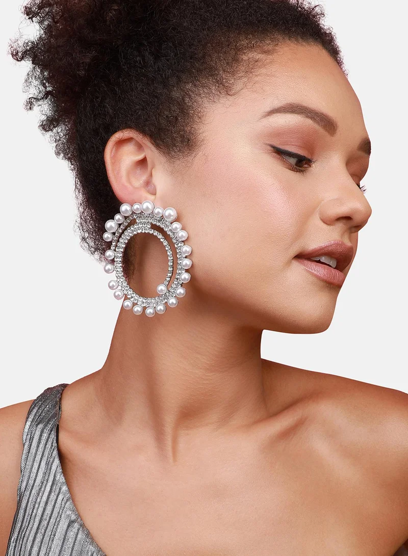 سوهي الدوائر المشعة: أقراط سوهي