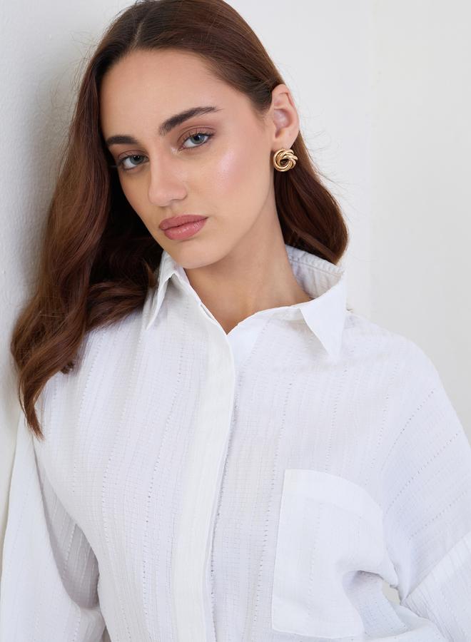 ستايلي بلوزة واسعة بتفاصيل بارزة الملمس مع أكمام بأساور - Image 4