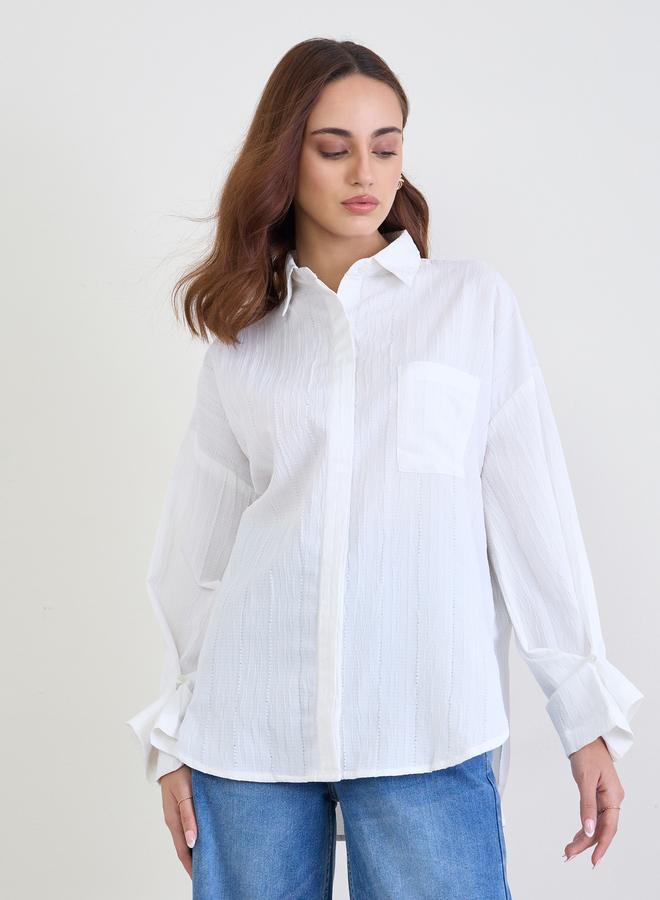 ستايلي بلوزة واسعة بتفاصيل بارزة الملمس مع أكمام بأساور - Image 3