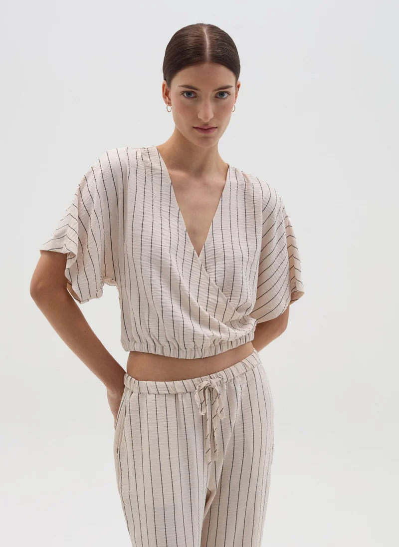 او في اس Beige