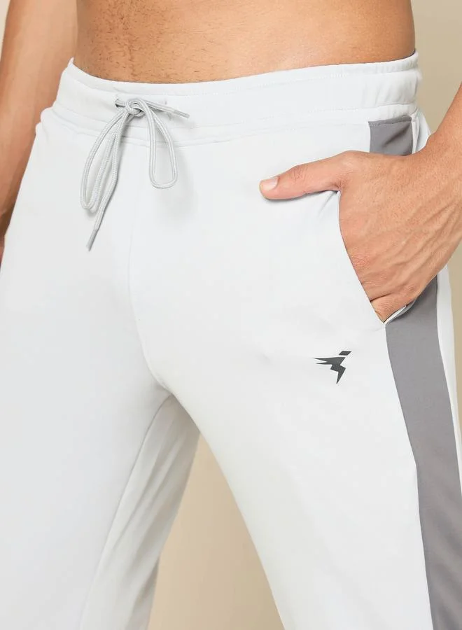 Technosport Side Striped 4-Way Stretch Relaxed Fit Track Pants by Styli