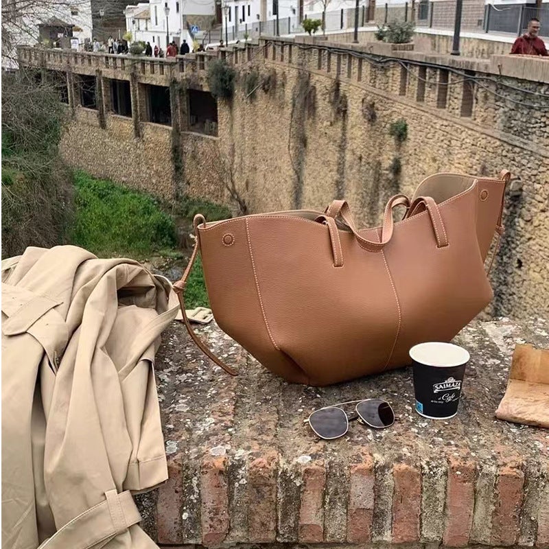 حقيبة توت مستوردة من الجلد بتصميم فرنسي محدث جديدة من سايم جلدية محمولة بسعة كبيرة للتسوق باللون الجمل - Image 3