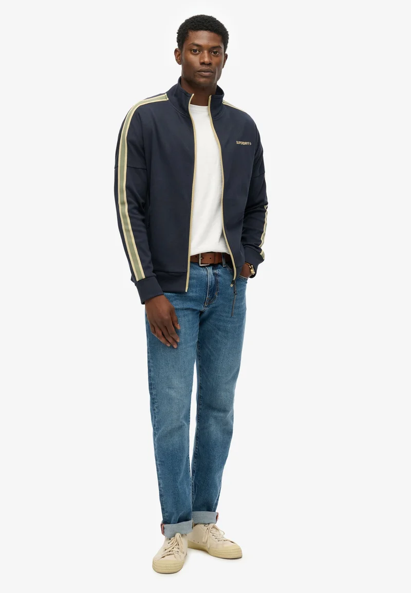 Superdry  Tech Cult Loose Track Top for Men | Best Price UAE