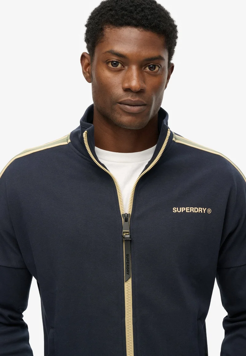 Superdry  Tech Cult Loose Track Top for Men | Best Price UAE