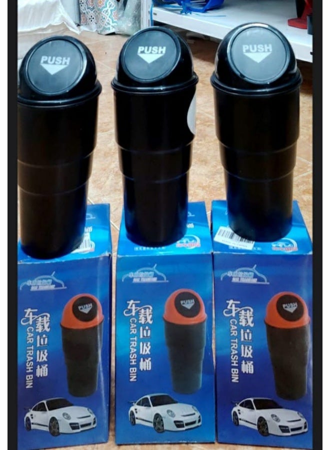 A set of three small car trash bins. - Image 1