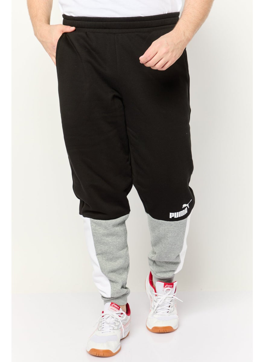 PUMA Men Sportswear Fit Outdoor Sweatpants, Black  - Image 1
