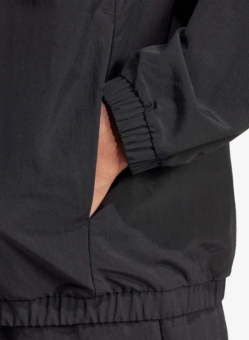 Adidas  Essential Small Logo Windbreaker for Men | Best Price UAE