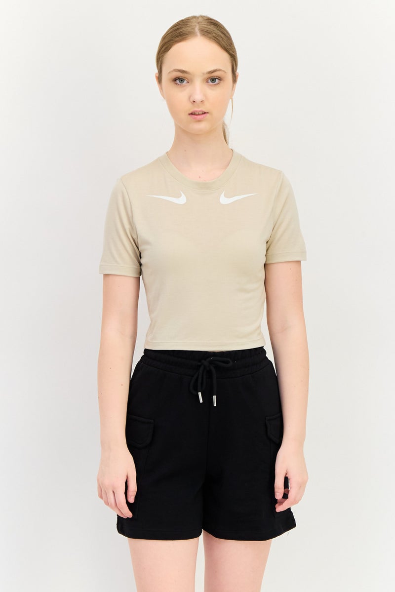 Nike قمصان تدريب قصيرة الأكمام للنساء بتصميم نحيف، بيج - Image 1